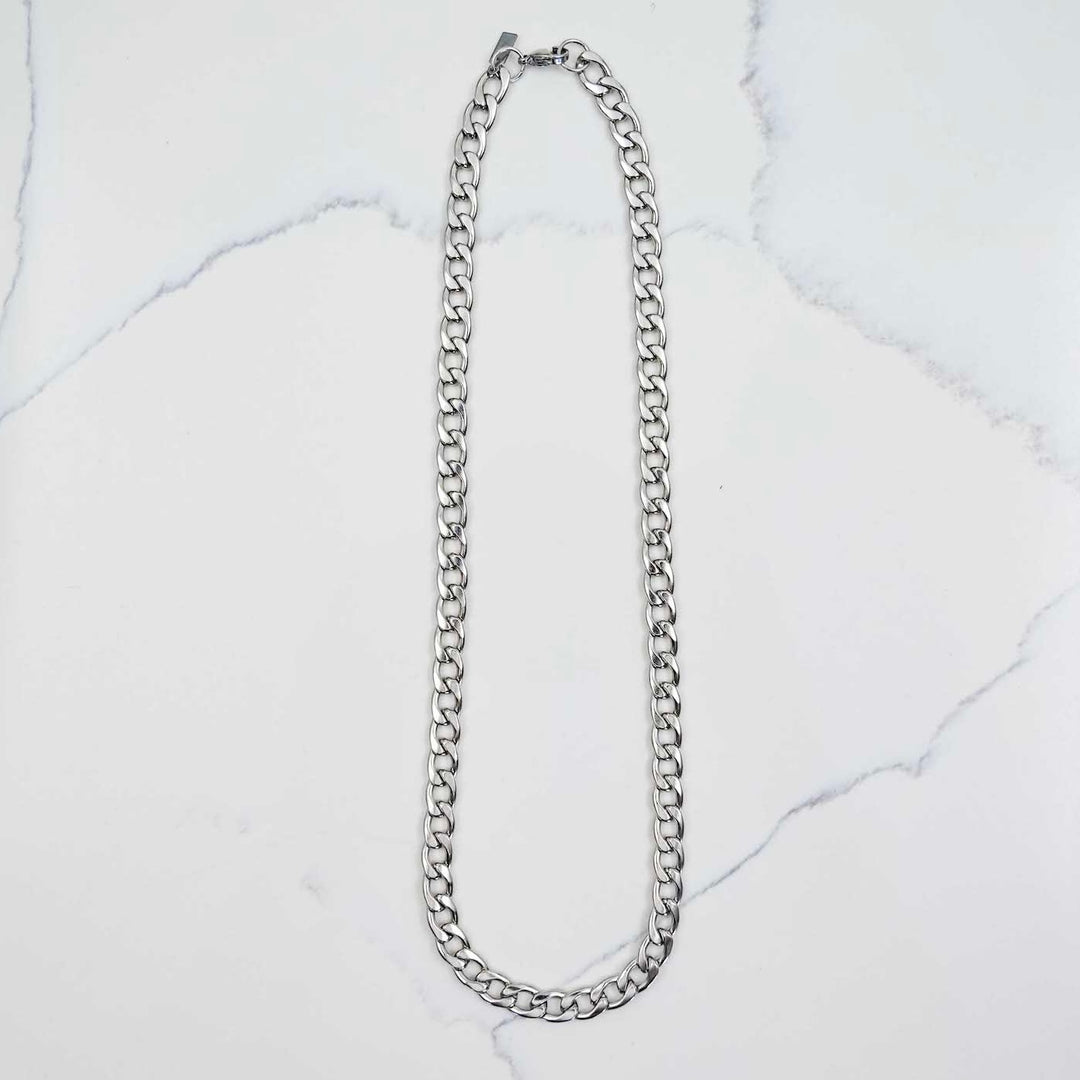 Cuban Link Chain - Silver (7mm) on White Marble