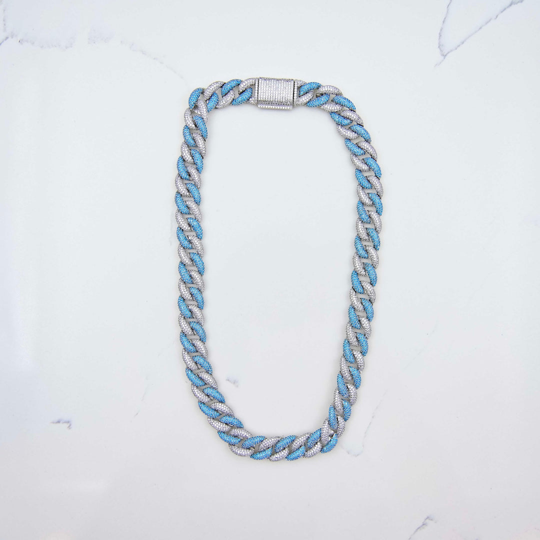 Iced Miami Cuban Link - Blue/White Gold (15mm) on White Marble
