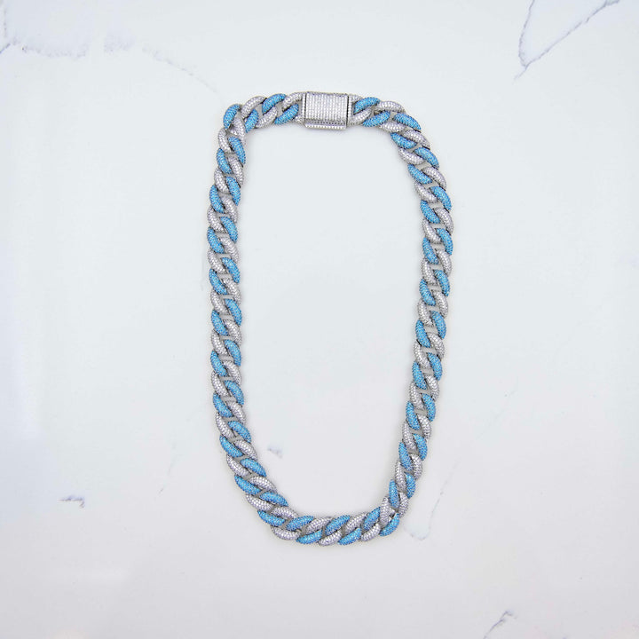 Iced Miami Cuban Link - Blue/White Gold (15mm) on White Marble