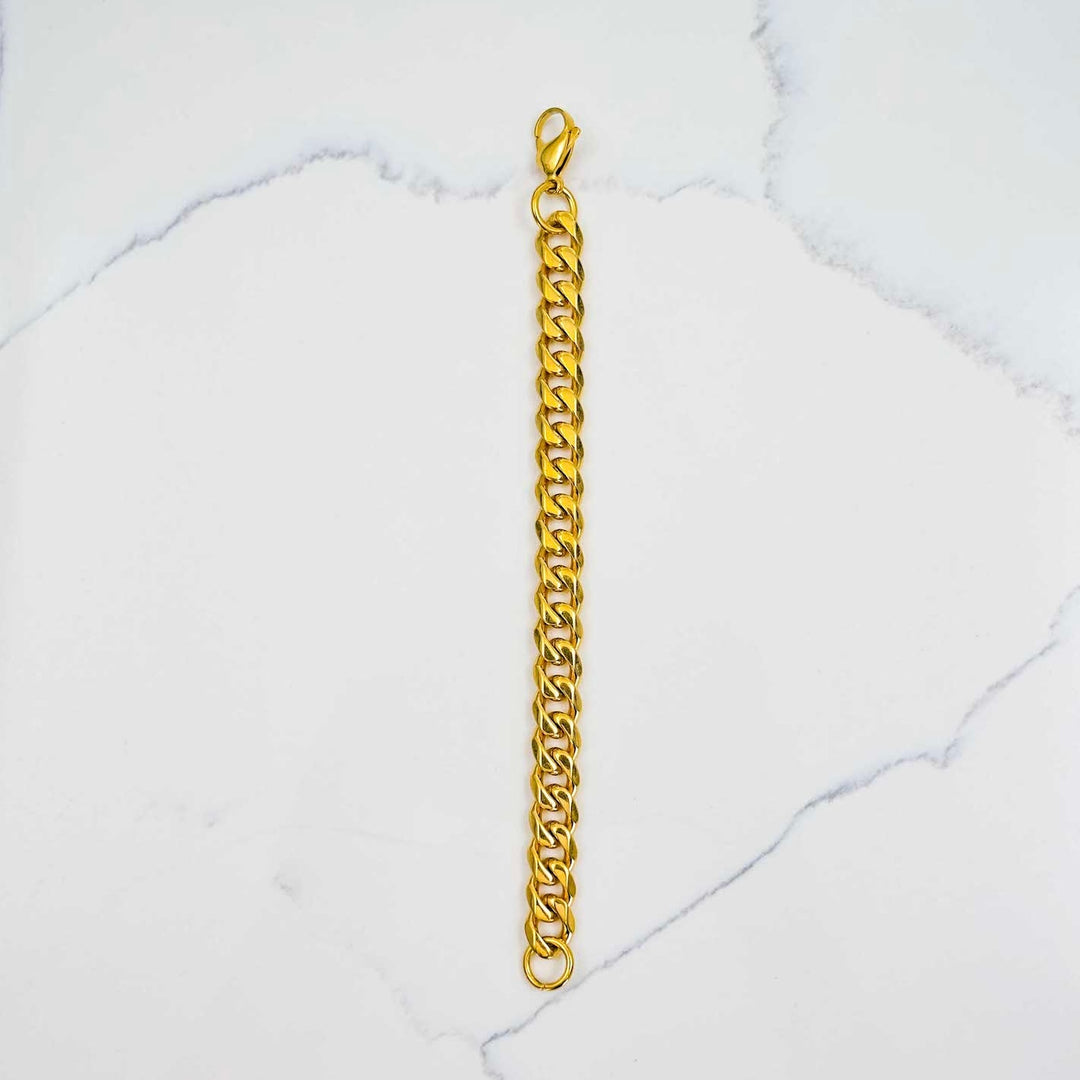 Miami Cuban Link Bracelet - Gold (11mm) on White Marble