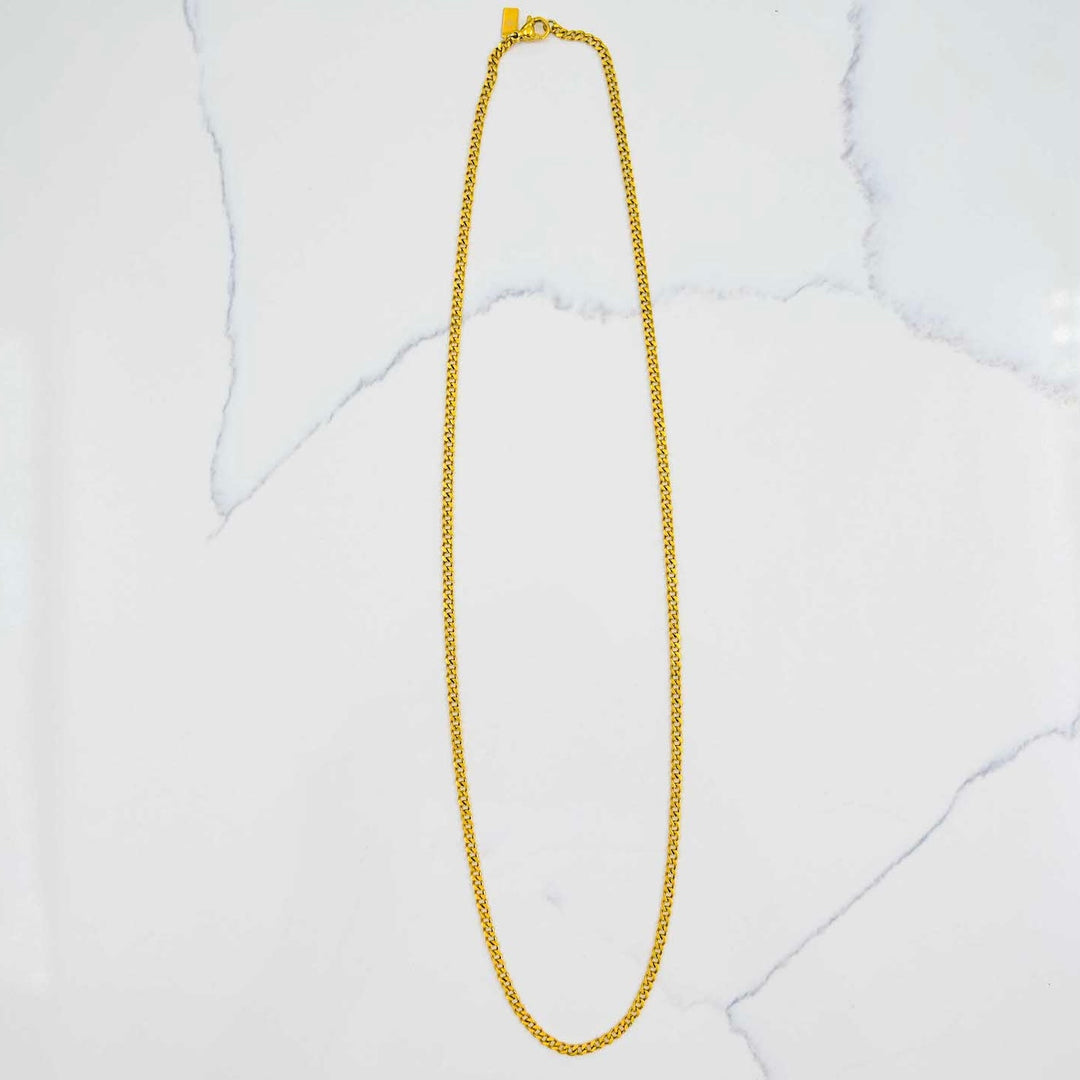 Miami Cuban Link Chain - Gold (3mm) on White Marble