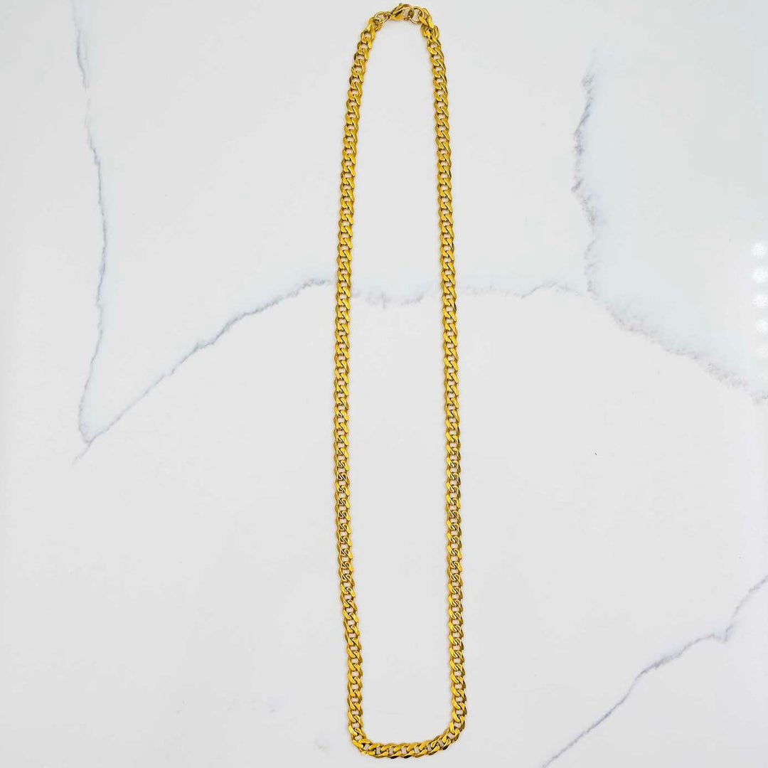 Miami Cuban Link Chain - Gold (5mm) on White Marble
