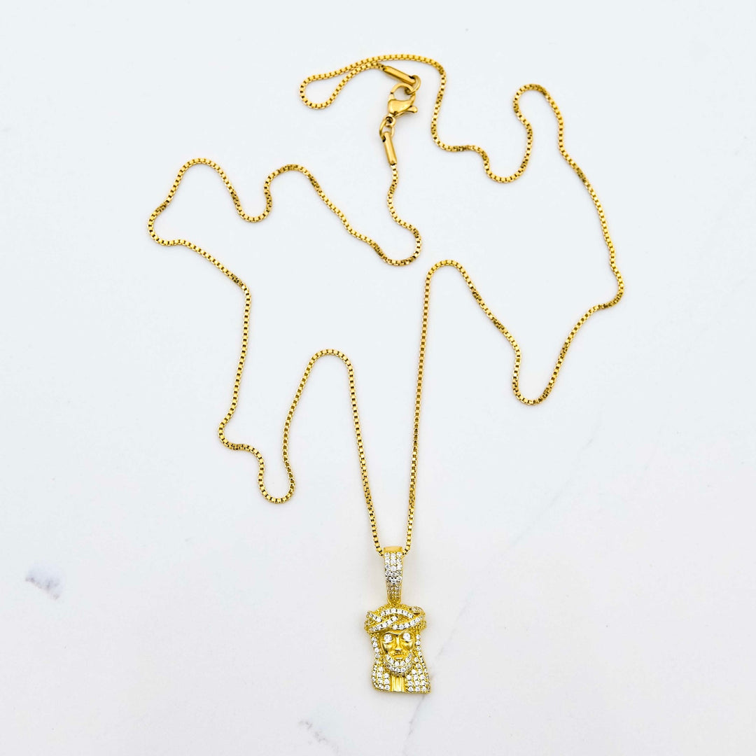 Micro Jesus Piece (925 Sterling Silver) - Yellow Gold on White Marble
