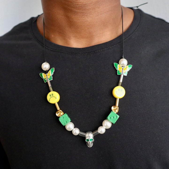Model Wears The Smiley Pearl Necklace - Green Dice