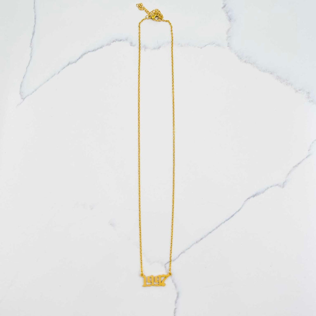 1997 Nameplate Necklace - Gold on White Marble