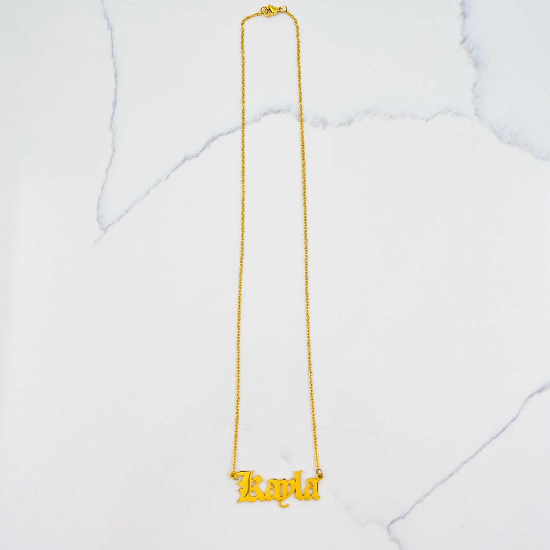 Women's Custom Nameplate Necklace - Gold on White Marble